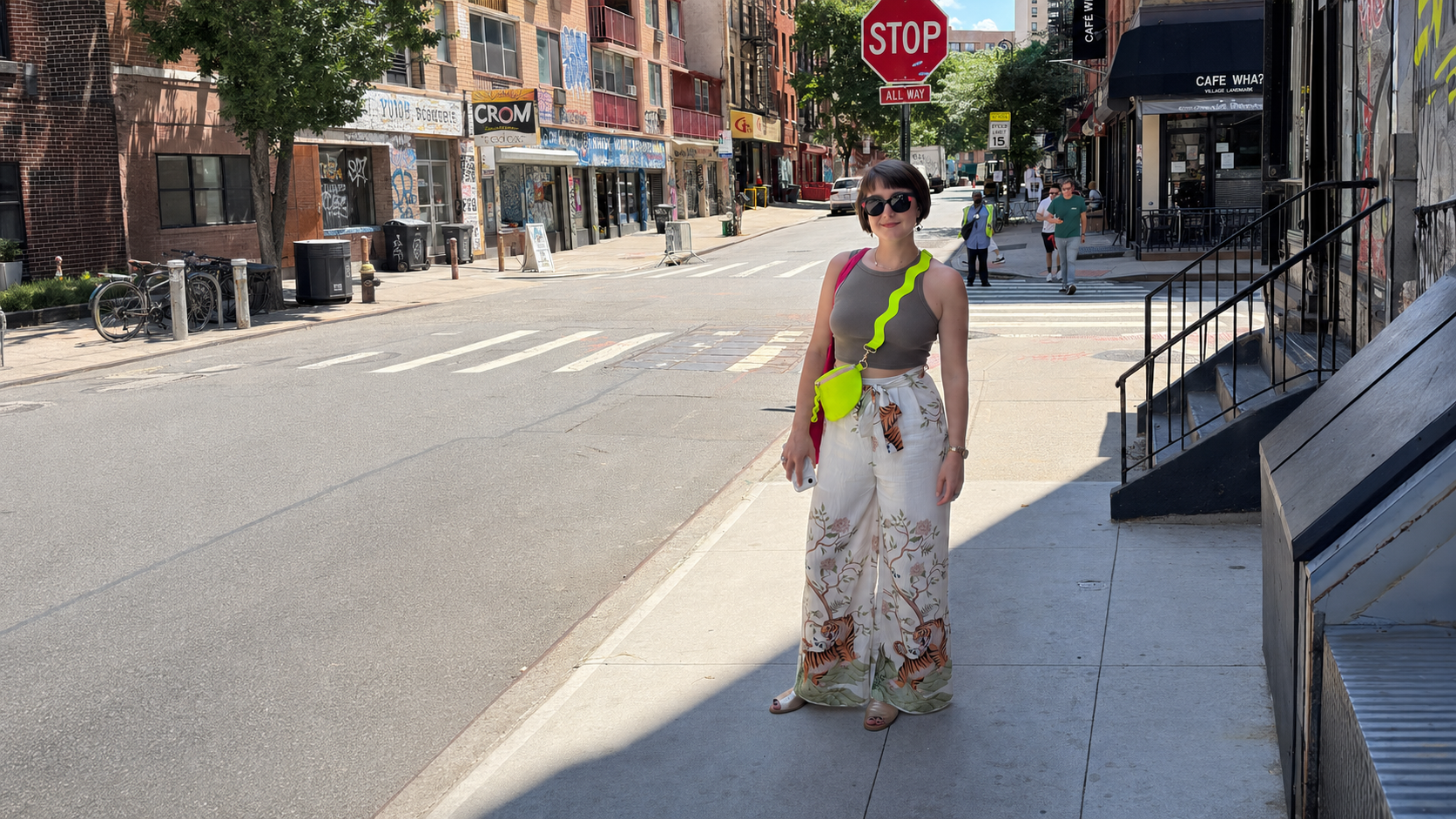 A Womads crossbody bag styled on a New York City street